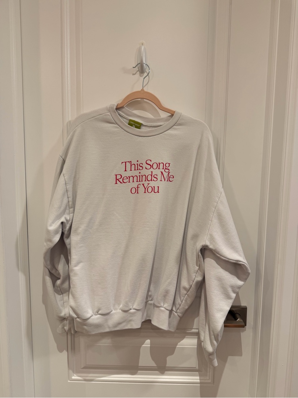 White Crewneck Sweatshirt with Pink Text "This Song Reminds Me of You"